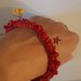 Bracciale rosso ad uncinetto con stelle 