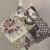 Coppia di presine papillon patchwork grigio