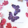 Orecchini viola farfalla