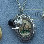 Cappellaio matto, collana locket porta foto