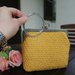 Clutch con braccialetto