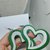 Orecchini cuore verde e glitter in legno