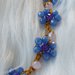 Collana choker girocollo con fiorellini colorati azzurri  e viola