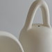 Campanella in terracotta bianca manico ad anello bomboniera artigianale cm 7x9