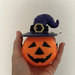 Decorazione Halloween con zucca in plastica e cappello