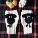  Mezzi guanti Pecora  handmade a maglia in bianco e nero con applicazione 