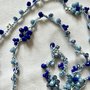 Collana di cristalli con i colori del blu