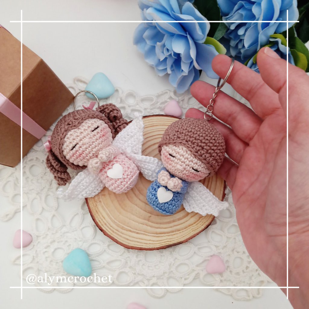 Bomboniera battesimo bimbo bimba piccolo angelo portachia