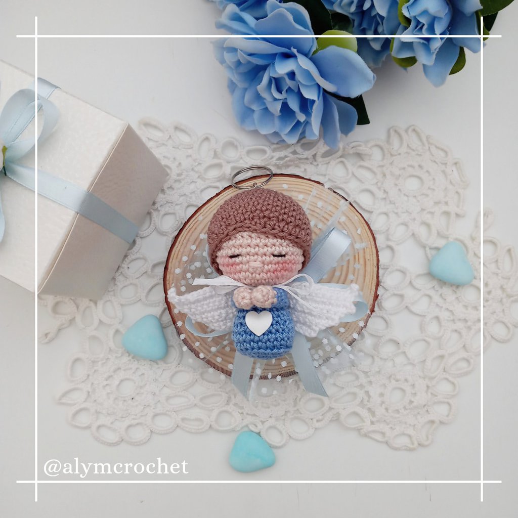 Bomboniera battesimo bimbo bimba piccolo angelo portachia