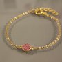 Bracciale acciaio oro con brillantini fuxia