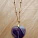 Collana con cuore in pietra dura viola (agata) e catenella in acciaio dorato 
