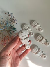 Sonaglino in gesso ceramico bomboniera nascita