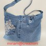             Borsa jeans con applicazione pizzo