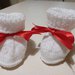 Tre paia di scarpine di lana per neonati