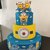 Torta finta tre piani decorativa Minions cattivissimo me scenografica festa compleanno 