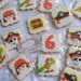 Biscotti a teme in ghiaccia reale winnie the pooh alice nel paese delle meraviglie paperina topolino curioso come george