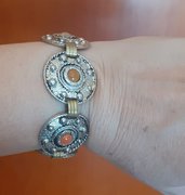 Bracciale a dischetti con pietrine