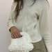 Clutch bag Puffosa bianco latte