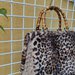 Borsa tote invernale di pelliccia ecologica e crochet 