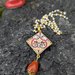 Collana cristalli con pendente in ceramica a rombo