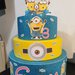 Torta finta Minions cattivissimo me Aristogatti gomma crepla Eva decorazioni compleanno festa battesimo 