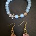 Parure bracciale e orecchini con bambina