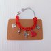 Bracciale multicharm rosso