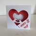 Quadretto shadow box di carta con mani cuore 