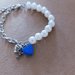 Bracciale perle e cuore blu