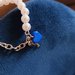 Bracciale perle e cuore blu