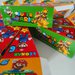 scatole Super Mario a forma di fetta torta scenografica personalizza regalini fine festa