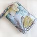 Pochette con stampa floreale – Eleganza e praticità