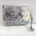 Pochette con stampa floreale – Eleganza e praticità