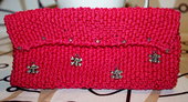 borsa pochette in cotone fucsia con teschi