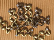 9 moduli bracciale metallo dorato + strass vend.
