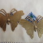 2 farfalle bronzo  69x49 mm.