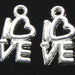 lotto da 5 charms simbolo amore argento tibetano 1cm 