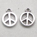 lotto da 5 charms simbolo pace argento tibetano 1cm 