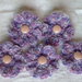 5 fiori in melange lilla e rosa lavorati all'uncinetto.   5 flowers,pink,lilac,melange yarn,crocheted ,supplies