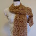 Sciarpa di lana boucle' ocra e borbeaux  lavorata a maglia    Scarf  knitted in boucle'ocre burgundy wool yarn