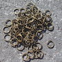 100 anellini in bronzo 6 mm.