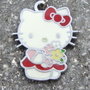 Hello Kitty rosso con mazzo di fiori 