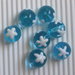 8 perle vetro azzurro con stella bianca 12mm vend.