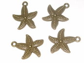 4 charms in bronzo stella marina vend.