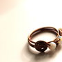Copper ring with white beads stone