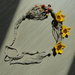 collana di spago con fiori e perline