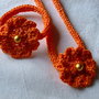 Set collana e bracciale arancione,all'uncinetto con fiore