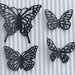 4 farfalle metallo nero  vend.