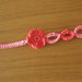 Collana fiore a croquet rosa-corallo