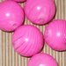 12 perle lucite rosa e fucsia di diverse misure vend.